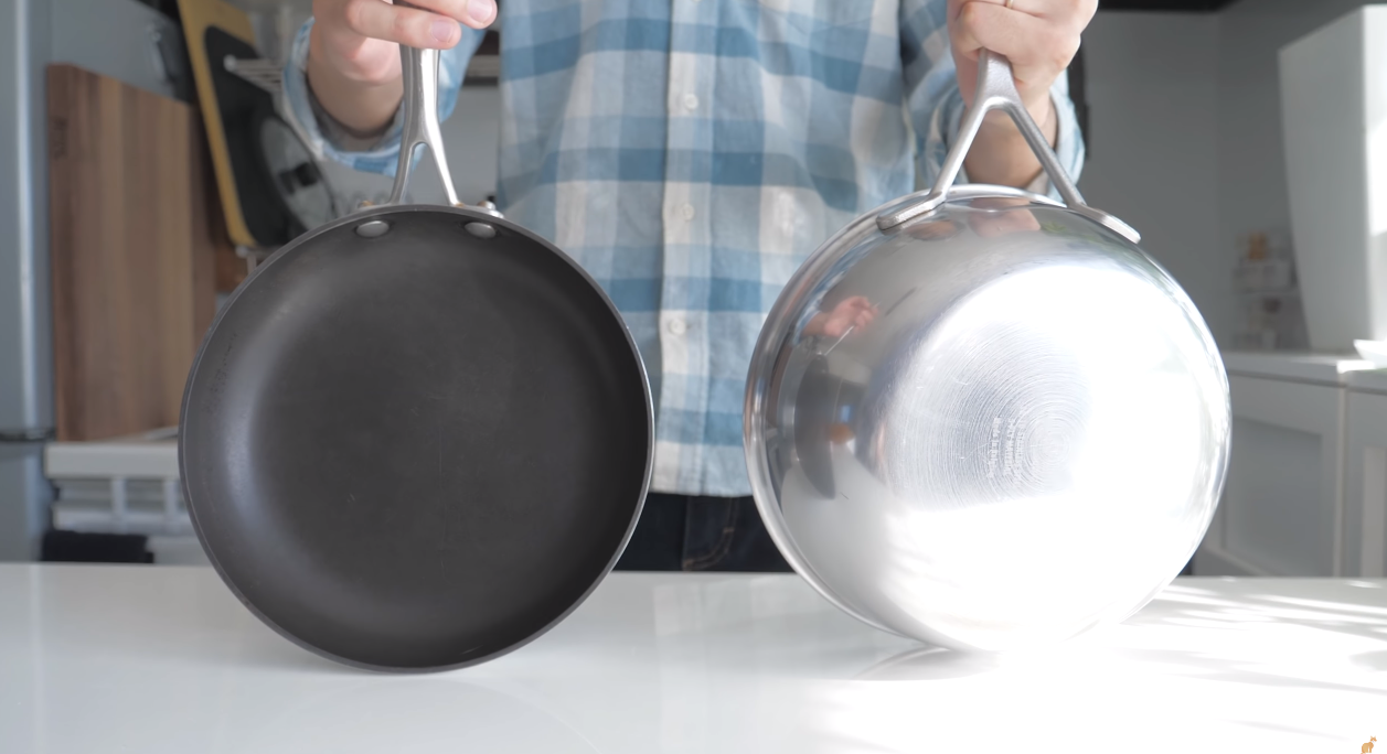 dark coated pan vs metal